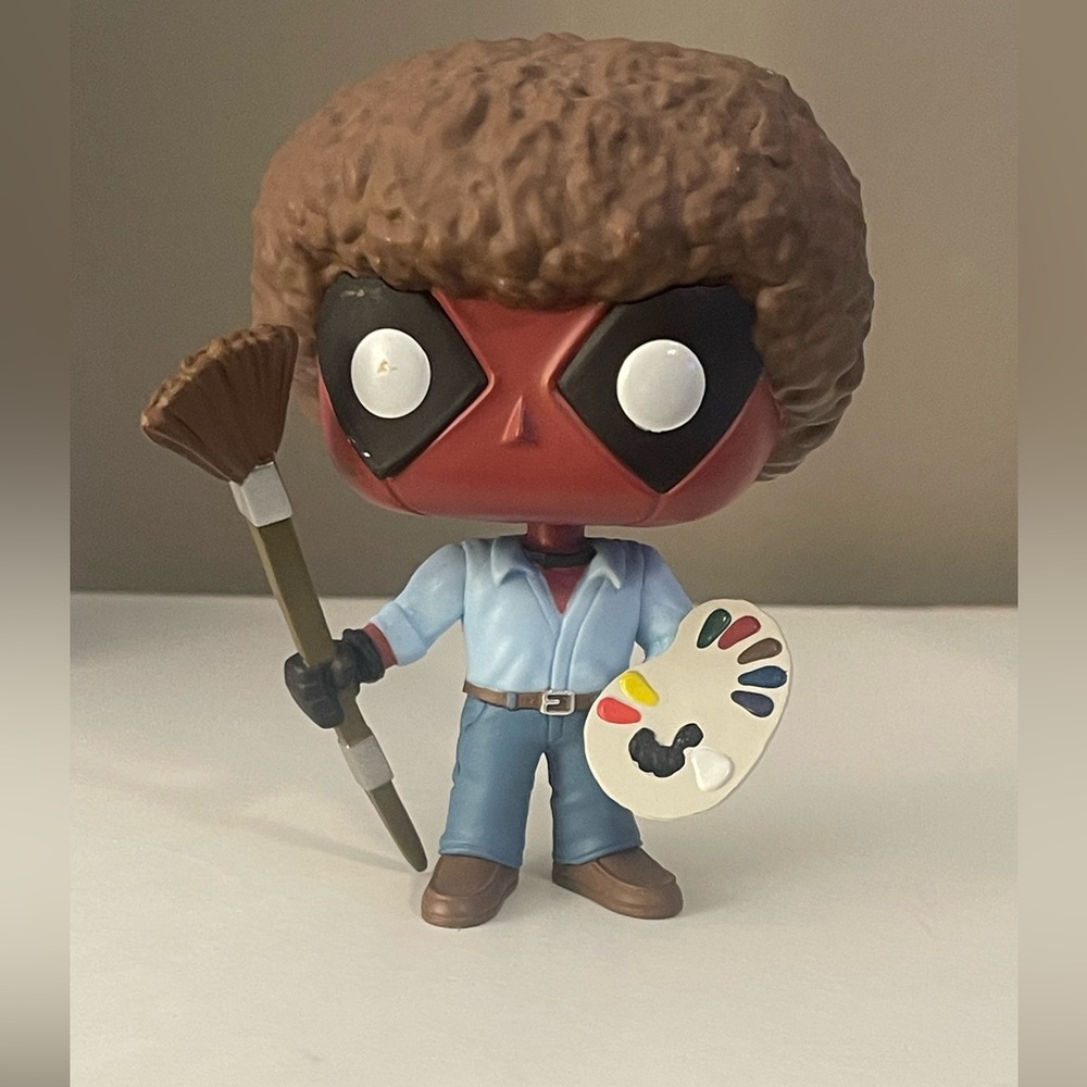 FunkoPop of  Bobble Head Deadpool dressed as Bob Ross